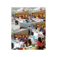 Participants taking part in a hands-on Silver Wellbeing cooking workshop.