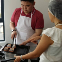 People preparing food together in a kitchen